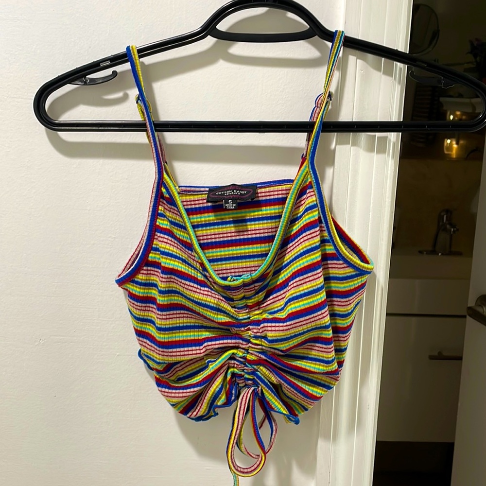 A small rainbow crop top that’s sinches